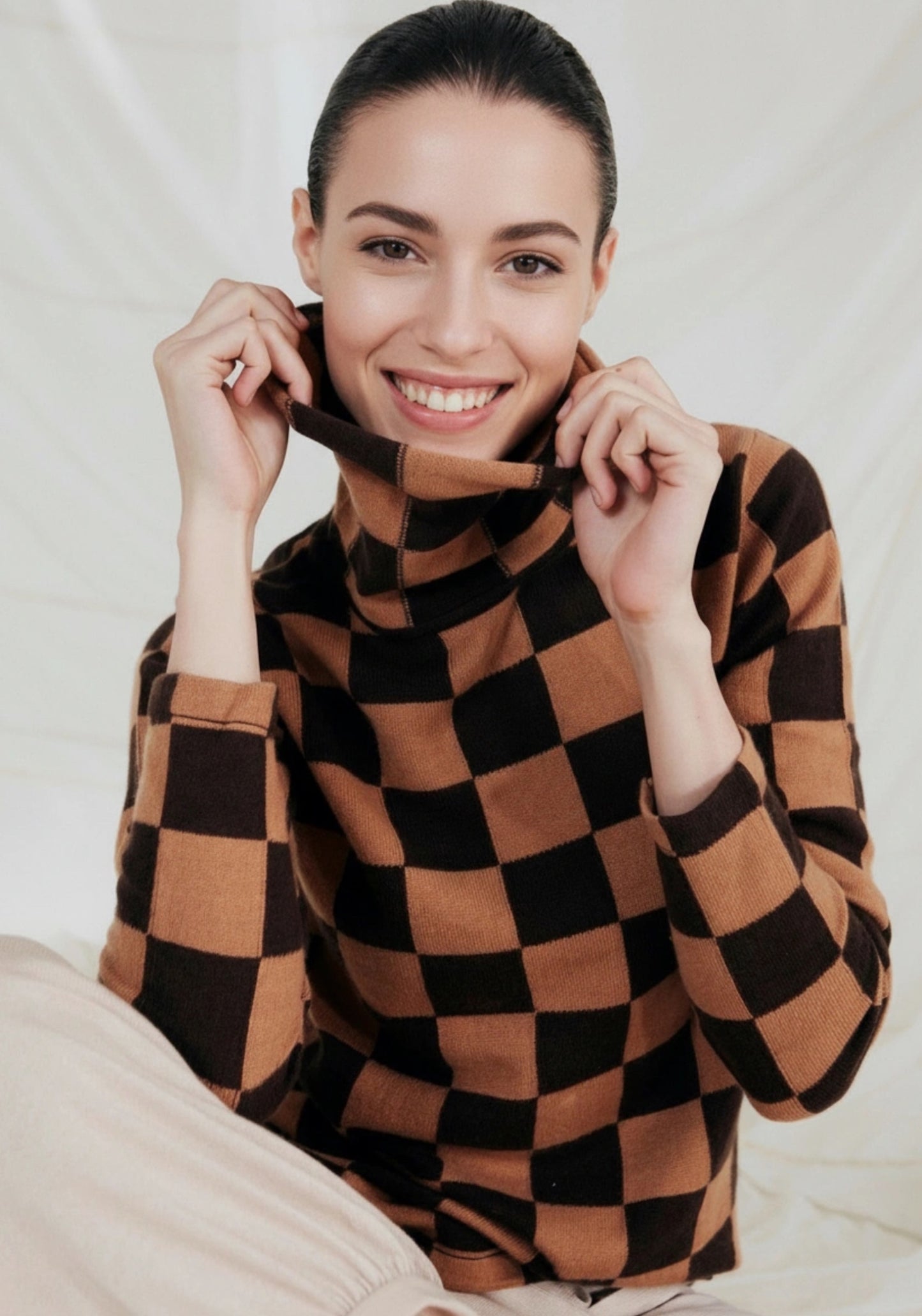 100% Cashmere Chessboard Roll Neck.